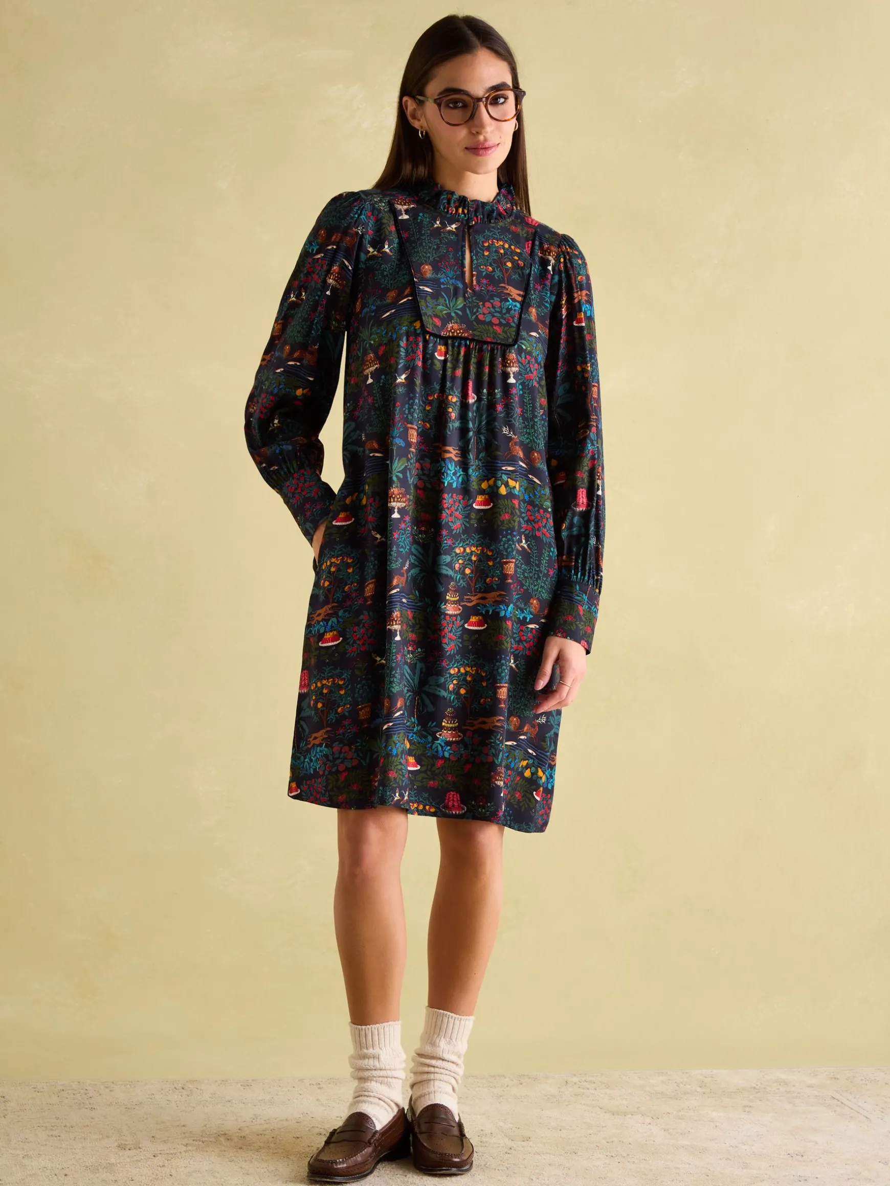 Rosette Black Printed Dress with Pie Crust Neck